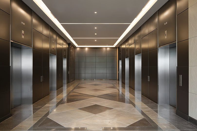 Modern Miami office building with integrated elevators access and garage control gates
