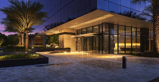 Corporate building entrance with integrated perimeter security lighting
