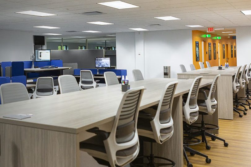 Corporate office in Miami, built for future collaboration, minimal desks