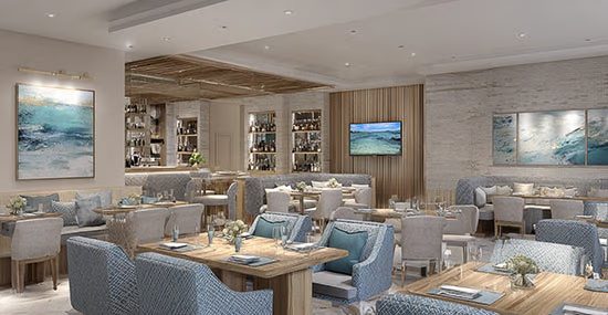 Upscale hotel bar with subtle integrated video wall and warm layered lighting
