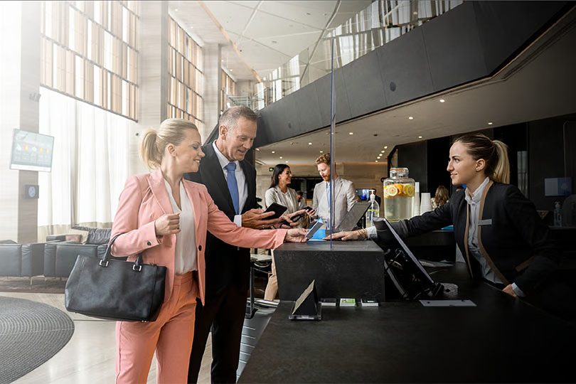 South Florida boutique hotel lobby connected to terrace with balanced lighting