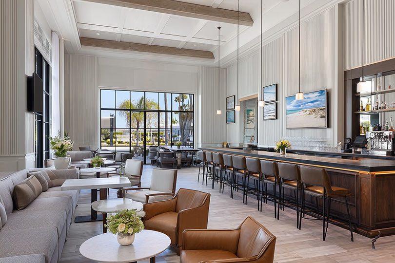 Boutique hotel lounge and bar with unified lighting and AV environment