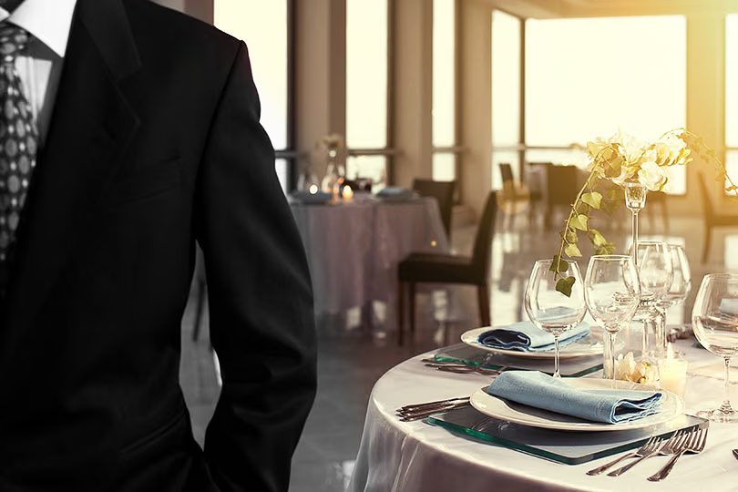 Boutique hotel restaurant and bar with balanced lighting and integrated display