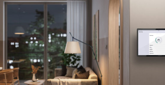 Crestron touch panel displaying home energy usage in a modern Miami smart home living space