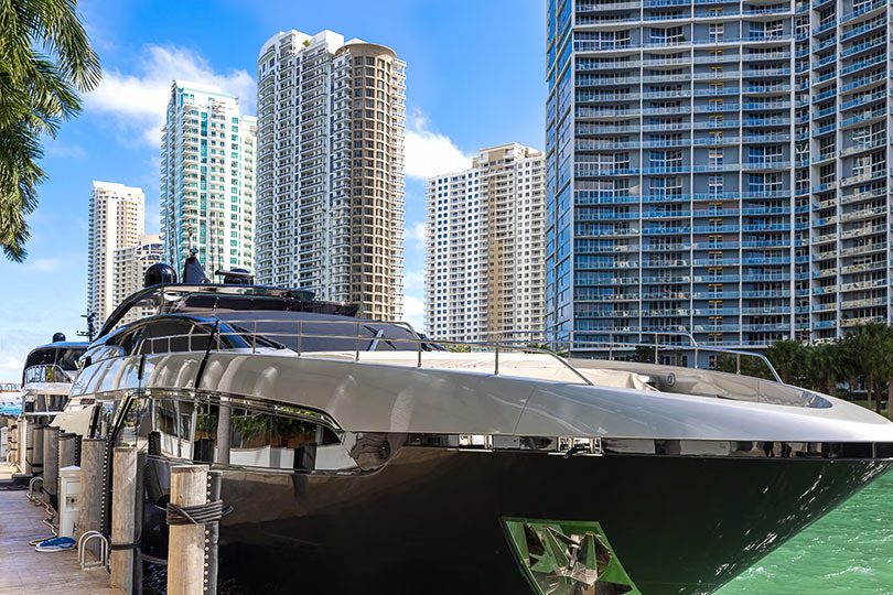 Docked luxury yacht in Miami marina where vessels often undergo technology and AV system upgrades.