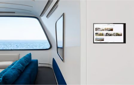 Yacht Crestron control system touchscreen used for managing onboard technology.
